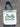 Tote bag with 'Freshly Grown in Washington' text on a textured surface
