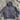 Gray hoodie on a sandy surface